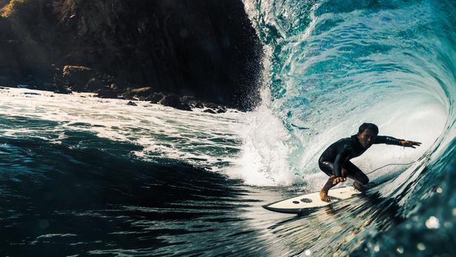 Indonesian surf guide Wayan Santika takes on the hollow surf of a break in East Sumba.