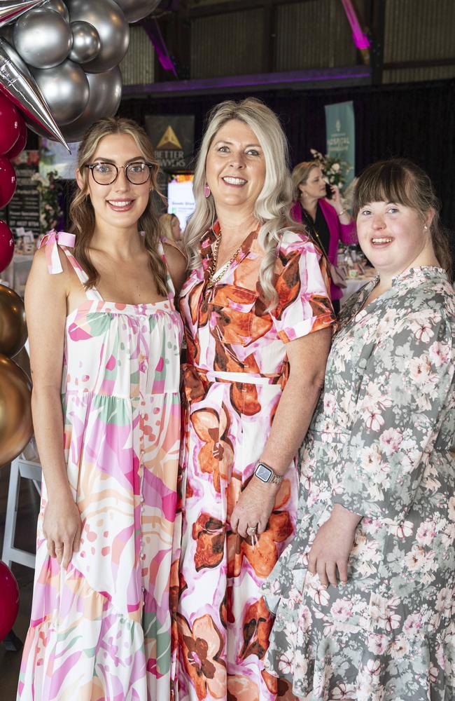 Fiona Clegg with her daughters Georgia (left) and Bella Clegg at Pink High Tea Toowoomba Hospital Foundation fundraiser at The Goods Shed, Saturday, October 12, 2024. Picture: Kevin Farmer