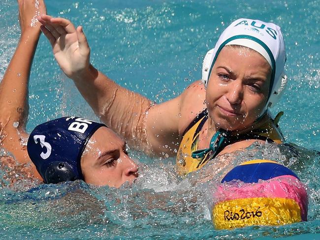 RIO DE JANEIRO, BRAZIL - AUGUST 13: Zoe Arancini #9 of Australia and Marina Zablith #3 of Brazil go after the ball during the Womens Preliminaries on Day 8 of the Rio 2016 Olympic Games on August 13, 2016 in Rio de Janeiro, Brazil. (Photo by Rob Carr/Getty Images)