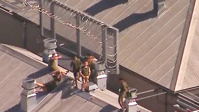 Channel 9 helicopter footage of prisoners on the roof at Borallon Training and Correctional Centre