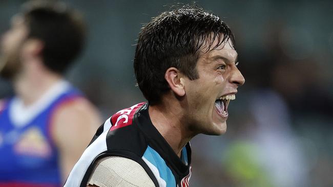 Port Adelaide's Zak Butters celebrates kicking a goal  during the AFL Gather Round match between Port Adelaide and the Western Bulldogs at the Adelaide Oval on April 15, 2023.  Photo by Phil Hillyard(Image Supplied for Editorial Use only - **NO ON SALES** - Â©Phil Hillyard )