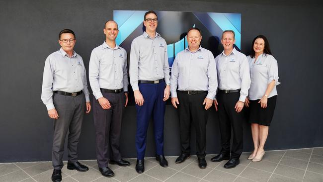 Enlightened Financial Solutions Mackay team of financial advisers (from left): certified financial planner Mike McLeod, financial planner Brendan Hughes, owner/financial planner Scott Jamieson, certified financial planner Mike Thackray, CEO/founder James Wortley and risk Adviser Simone Anderson. Picture: Jim Cullen Photography