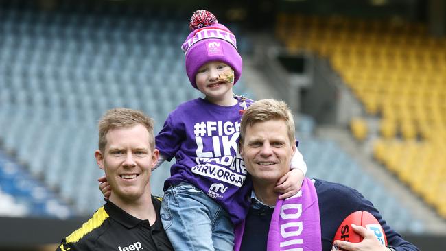 The Riewoldts with five-year-old Elliot Vanderland at the launch at Maddie’s Match. Picture: Michael Klein.