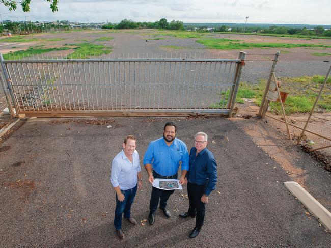 ‘Build it and they will come’ ... AFLNT, Larrakia and Darwin business officials with plans fro the new stadium. From left, Stuart Tottham, Nigel Browne and Sean Bowden at the proposed stadium site on McMinn St. Picture: Glenn Campbell