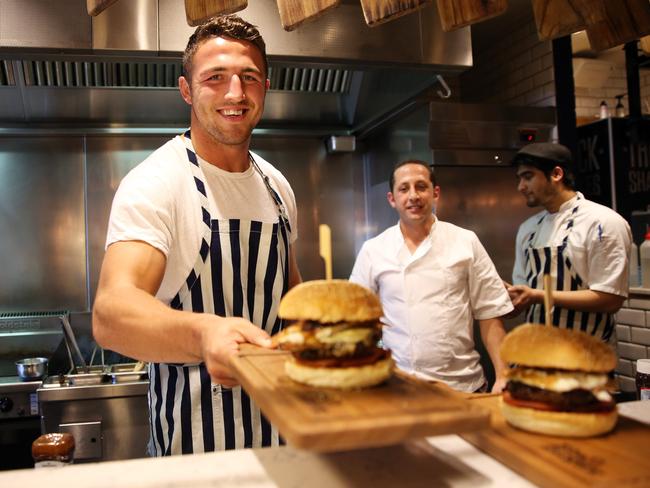 Sam serves up his signature dish. Picture Craig Greenhill