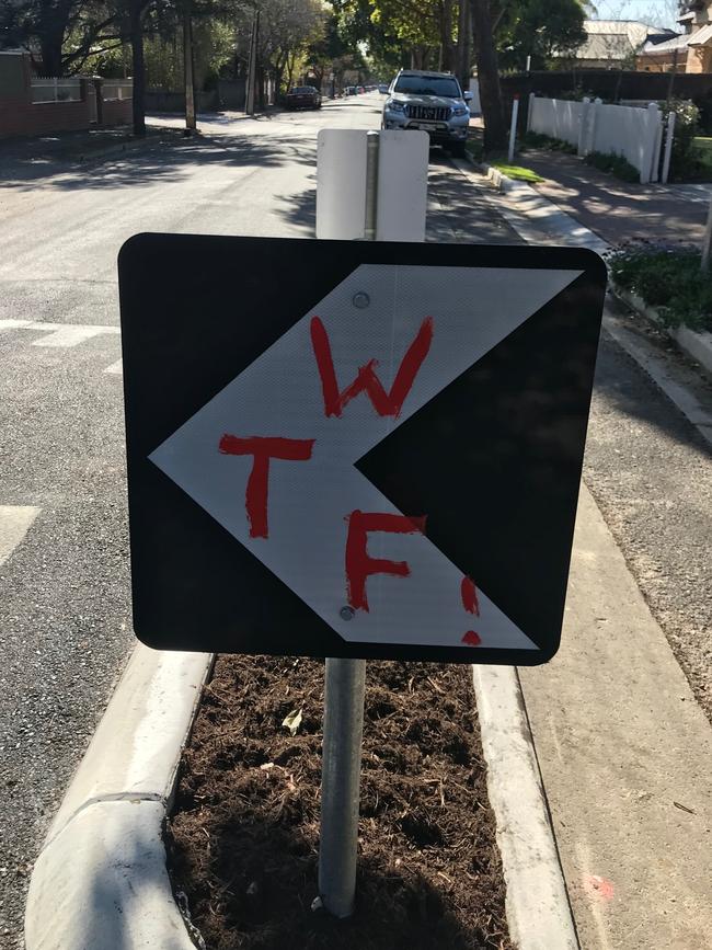 Defaced signs on Weller St at Goodwood. Picture: Jessica Adams