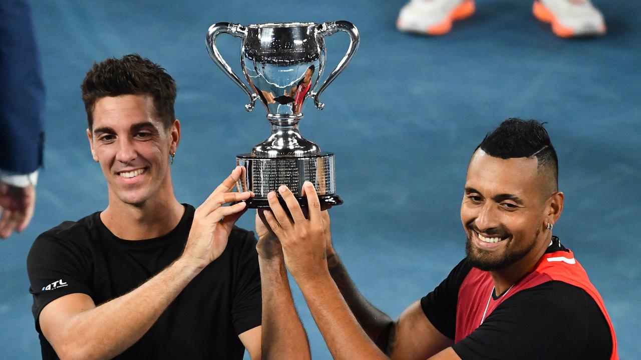 Thanasi Kokkinakis, with Nick Kyrgios after winning the Australian Open doubles, is back in Australia’s Davis Cup squad. Picture: AFP