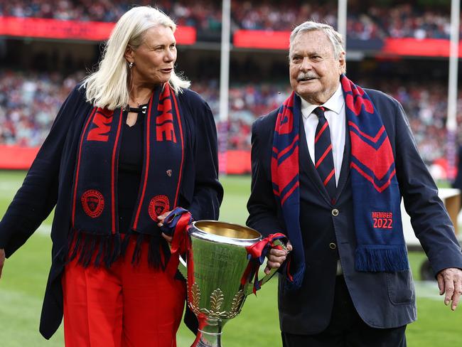 Kate Roffey and Dees legend Ron Barassi with the club’s premiership trophy in 2022. Picture: Michael Klein