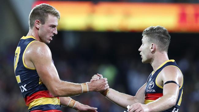 Daniel Talia and Rory Laird are mainstays of the Crows defence.