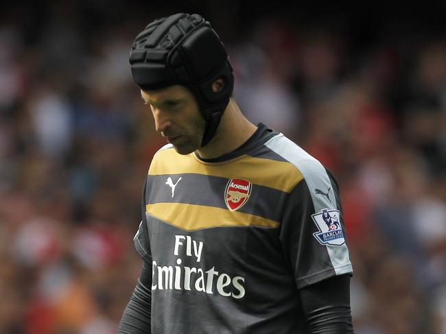 Arsenal's Czech goalkeeper Petr Cech reacts during the English Premier League football match between Arsenal and West Ham United at the Emirates Stadium in London on August 9, 2015. West Ham won the game 2-0. AFP PHOTO / IKIMAGES RESTRICTED TO EDITORIAL USE. No use with unauthorised audio, video, data, fixture lists, club/league logos or "live" services. Online in-match use limited to 45 images, no video emulation. No use in betting, games or single club/league/player publications.