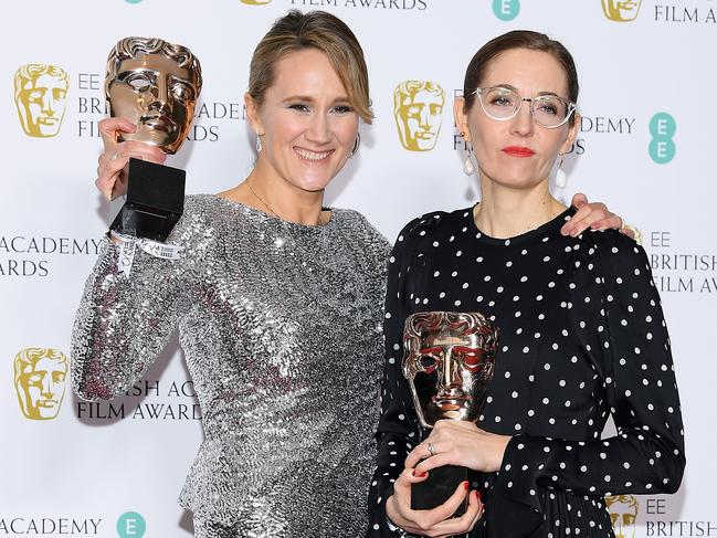 Winners of the Production Design award, Alice Felton and Fiona Crombie pose in the press room during the EE British Academy Film Awards. Picture: Getty