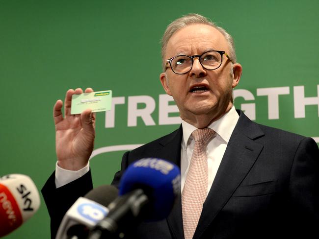 MELBOURNE, AUSTRALIA - NewsWire Photos FEBRUARY 26, 2025: Prime Minister Anthony Albanese hold up a Medicare Card during a press conference at the Urgent Care Clinic at the Goonawarra Medical Centre in Sunbury. Picture: NewsWire / Andrew Henshaw