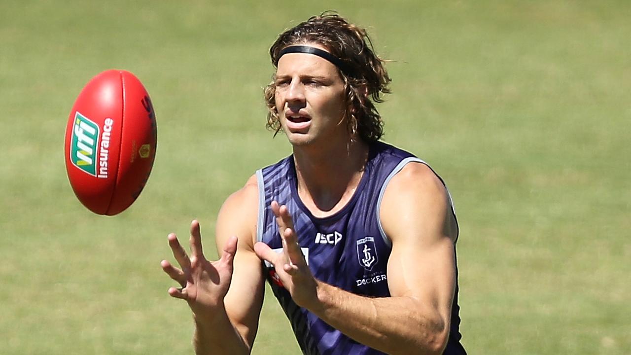 Nat Fyfe marks the ball during a Fremantle Dockers AFL training session.