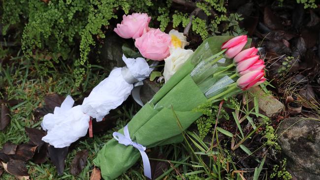 Flowers placed outside the Paul Pl residence in Carlingford after the stabbing tragedy. Picture: David Swift