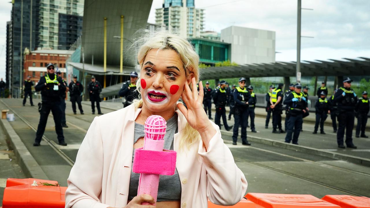 One protester dressed as a clown and mocked media coverage of the event. Picture: NewsWire / Luis Enrique Ascui