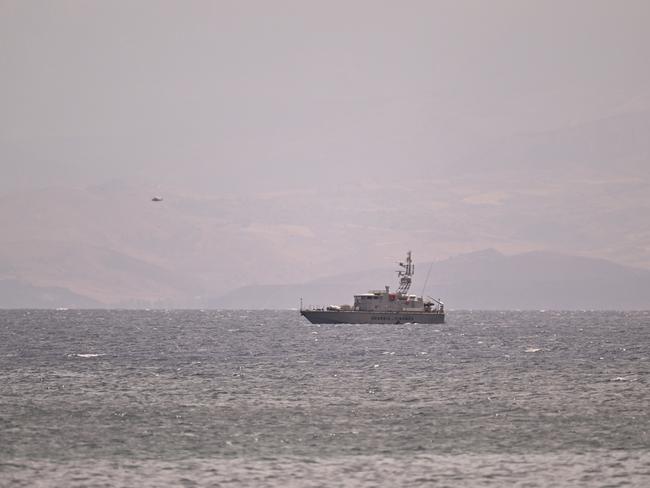 A coast guard vessel searches for missing passengers. Picture: Getty Images