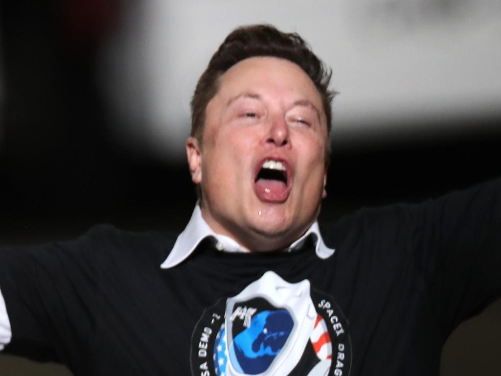 CAPE CANAVERAL, FLORIDA - MAY 30: Spacex founder Elon Musk celebrates after the successful launch of the SpaceX Falcon 9 rocket with the manned Crew Dragon spacecraft at the Kennedy Space Center on May 30, 2020 in Cape Canaveral, Florida. Earlier in the day NASA astronauts Bob Behnken and Doug Hurley lifted off an inaugural flight and will be the first people since the end of the Space Shuttle program in 2011 to be launched into space from the United States.   Joe Raedle/Getty Images/AFP == FOR NEWSPAPERS, INTERNET, TELCOS & TELEVISION USE ONLY ==