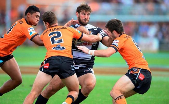 Seagulls stand-in Dave Taylor shows the Easts Tigers that taking him down is no easy feat. Picture: Steve Bell/SMP Images