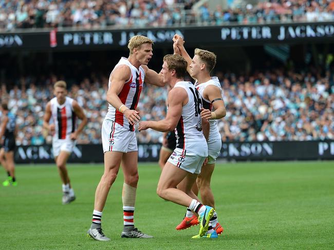 Nick Riewoldt celebrates kicking a goal.