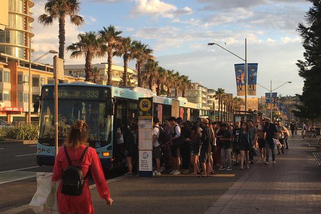 Buses are packed early this morning as revellers make their way home. Picture: Henry Lynch