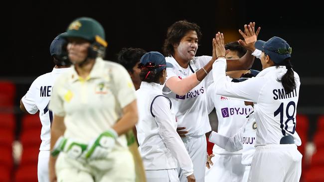 GOLD COAST, AUSTRALIA – OCTOBER 02: Jhulan Goswami of India celebrates after dismissing Alyssa Healy of Australia during day three of the Women's International Test match between Australia and India at Metricon Stadium on October 02, 2021 in Gold Coast, Australia. (Photo by Chris Hyde/Getty Images)