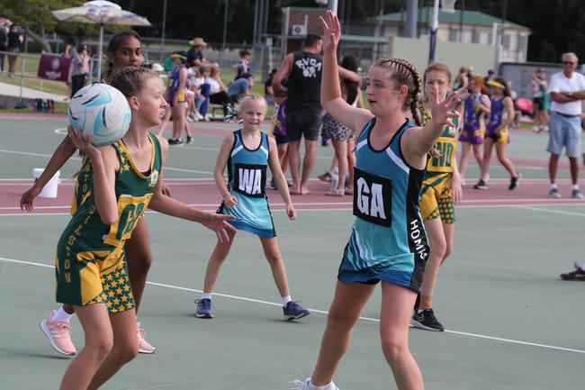 The Netball Qld Primary Schools Cup grand finals are being held at the Hinterland District Netball Association at Mudgeeraba. Homies (home schooled kids) player Annabel Wedgwood in action against Gilston. Picture: Mike Batterham.