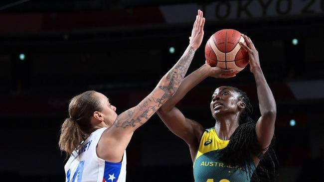 Ezi Magbegor (right) in action for Australia against Puerto Rico at the Olympic Games.