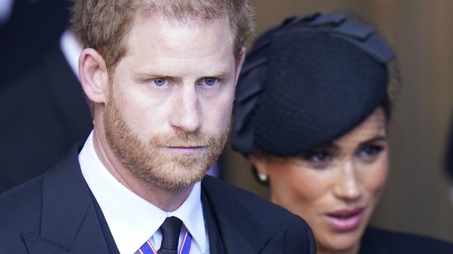 LONDON, ENGLAND - SEPTEMBER 14: Prince Harry and Meghan, Duchess of Sussex leave Westminster Hall, London after the coffin of Queen Elizabeth II was brought to the hall to lie in state ahead of her funeral on Monday on September 14, 2022 in London, England. Queen Elizabeth II's coffin is taken in procession on a Gun Carriage of The King's Troop Royal Horse Artillery from Buckingham Palace to Westminster Hall where she will lay in state until the early morning of her funeral. Queen Elizabeth II died at Balmoral Castle in Scotland on September 8, 2022, and is succeeded by her eldest son, King Charles III. (Photo Danny Lawson - WPA Pool/Getty Images)