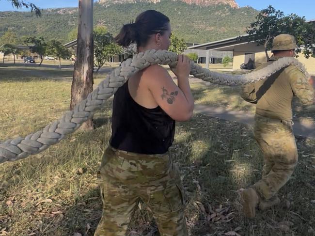 Townsville Bulletin journalist, Jami Roberts takes part in an army fitness session with soldiers from the 3rd Battalion, Royal Australian Regiment (3RAR). 9 May 2025
