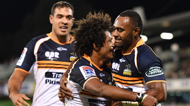 Brumbies winger Henry Speight celebrates after scoring a try at GIO Stadium.