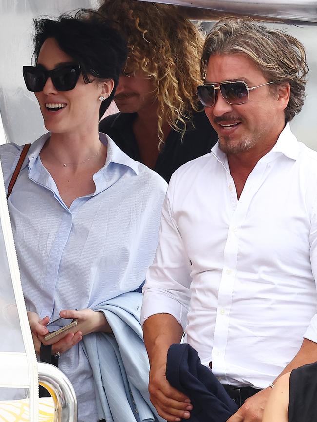 Budge and partner John Ibrahim were all smiles on the harbour cruise. Picture: Matrix