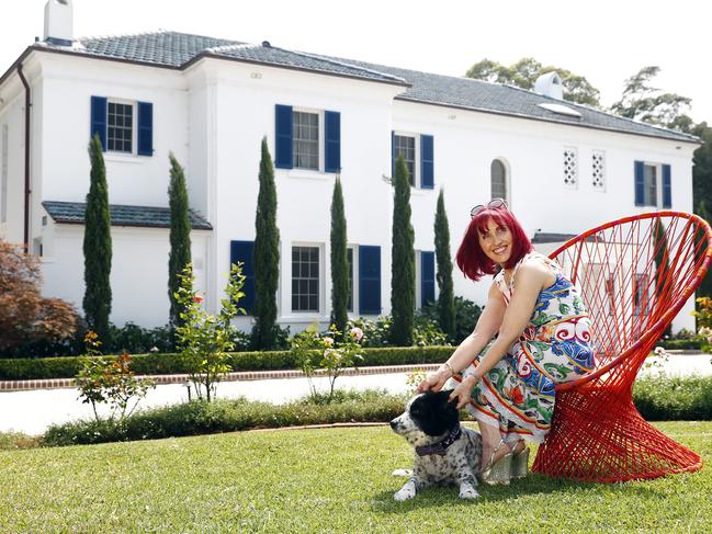 Beth with her dog Zoro sits outside her Rothiemay property. Picture: Sam Ruttyn