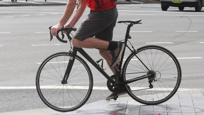 A self-confessed “pig-headed” pushbike rider told cops to “f*** off” after cycling without a helmet along a busy footpath. Generic picture