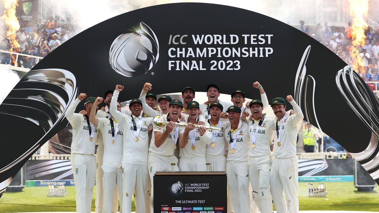 Pat Cummins of Australia lifts the ICC World Test Championship Mace during the trophy presentation ceremony. Photo by Ryan Pierse/Getty Images.