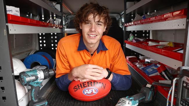 Cadman has been balancing football with work as an electrician for his family company this year. Picture: Michael Klein