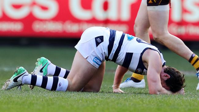 Patrick Dangerfield on the ground after injuring his leg. Picture: Michael Klein