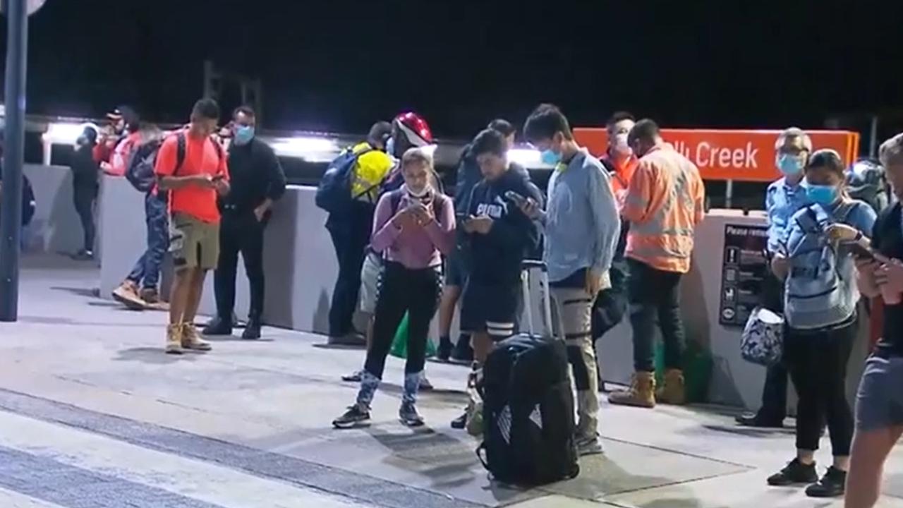 Confused commuters at Wolli Creek after all trains were cancelled in the middle of the night. Picture: 7 News