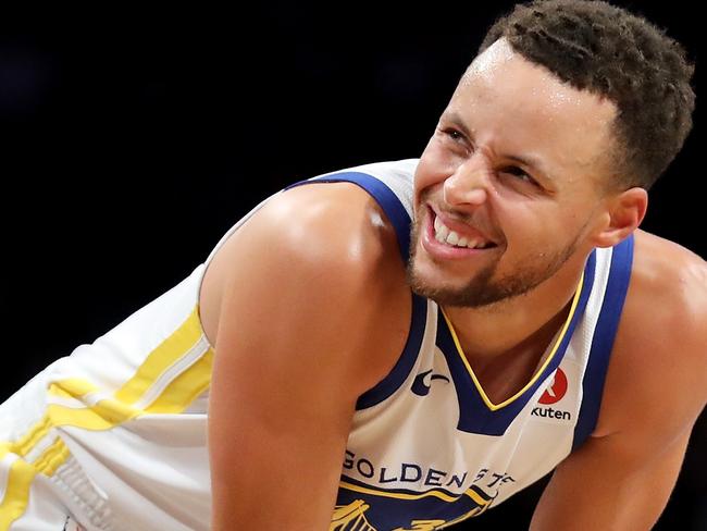 NEW YORK, NY - NOVEMBER 19: Stephen Curry #30 of the Golden State Warriors reacts in the second quarter against the Brooklyn Nets during their game at Barclays Center on November 19, 2017 in the Brooklyn borough of New York City. NOTE TO USER: User expressly acknowledges and agrees that, by downloading and or using this photograph, User is consenting to the terms and conditions of the Getty Images License Agreement.   Abbie Parr/Getty Images/AFP == FOR NEWSPAPERS, INTERNET, TELCOS & TELEVISION USE ONLY ==