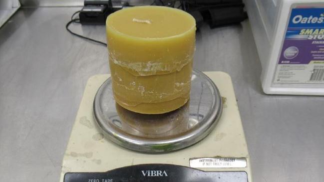 Australian Border Force officials intercepted four packages of candles from Canada which they allege contained significant amounts of pseudoephedrine – a precursor for methamphetamine. Photos: Supplied by Australian Border Force.