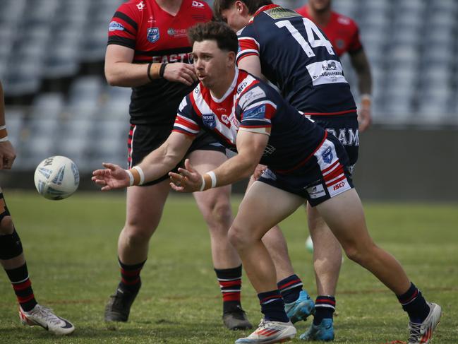 Hugh Prebble gets a pass away. Picture Warren Gannon Photography