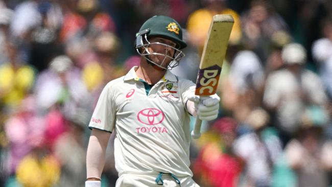 Warner finished with 57 in his final innings. Photo by Saeed KHAN / AFP