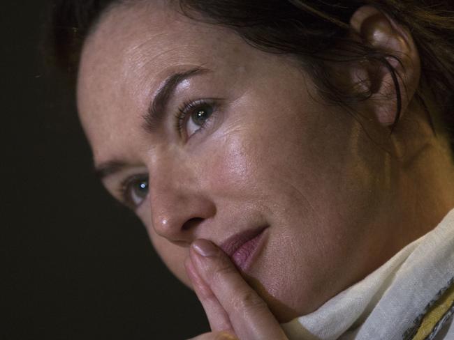 Game of Thrones star Lena Headey listens to a question during an interview with the Associated Press in Athens, on Friday, June 1, 2016. Game of Thrones stars Lena Headey traveled to Greece with co-stars Maisie Williams, and Liam Cunningham to visit refugee camps with the relief organization, the International Rescue Committee. (AP Photo/Petros Giannakouris)