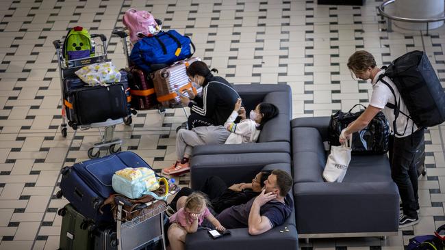 Travellers waiting for flights. Picture: NewsWire / Sarah Marshall