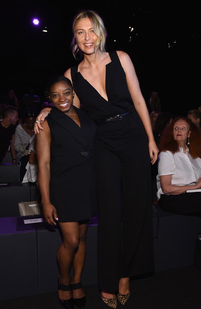 Simone Biles and Maria Sharapova attend the Vera Wang Collection fashion show on September 13, 2016. Picture: Getty