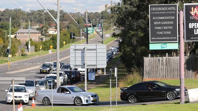 The testing queue at The Crossroads Hotel at Casula. Picture: Richard Dobson