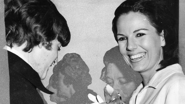 Julie Bonython getting John Lennon’s autograph at Adelaide Town Hall in 1964.