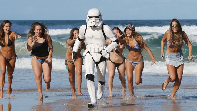 Ladies dig a Stormtrooper — Star Wars fan Sean May was mobbed on Surfers Paradise beach by Brazilian tourists who loved his classic Stormtrooper costume from Star Wars. Picture: Glenn Hampson