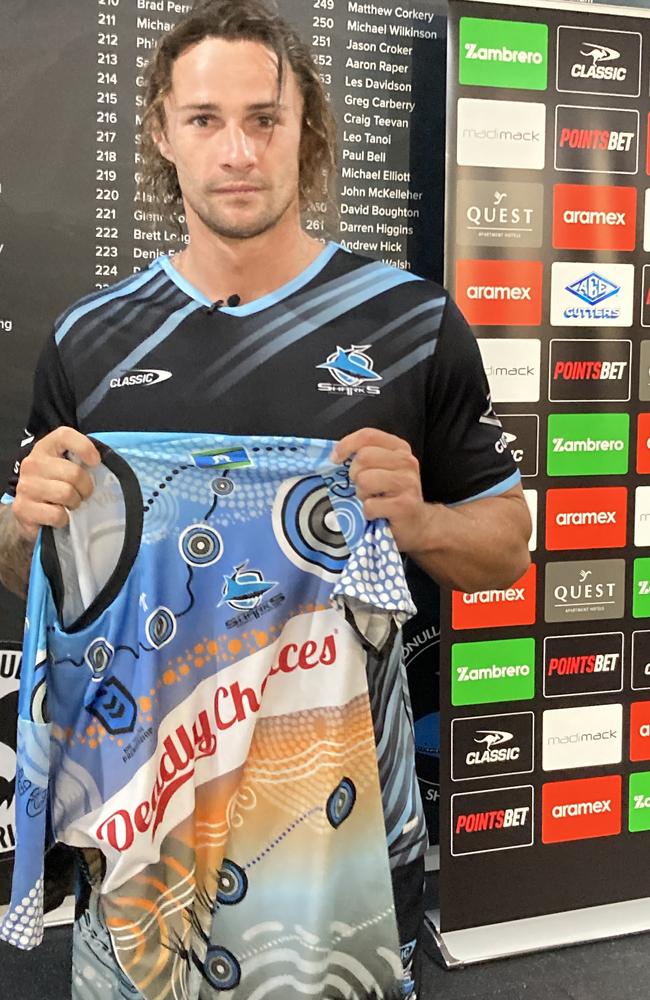 Nicho Hynes with an Indigenous Sharks jersey at a press conference on Tuesday. Picture: David Riccio