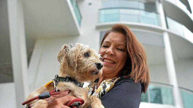 DOG'S LIFE: Lyn Henderson and Tawny love life in their highrise. Picture: Warren Lynam