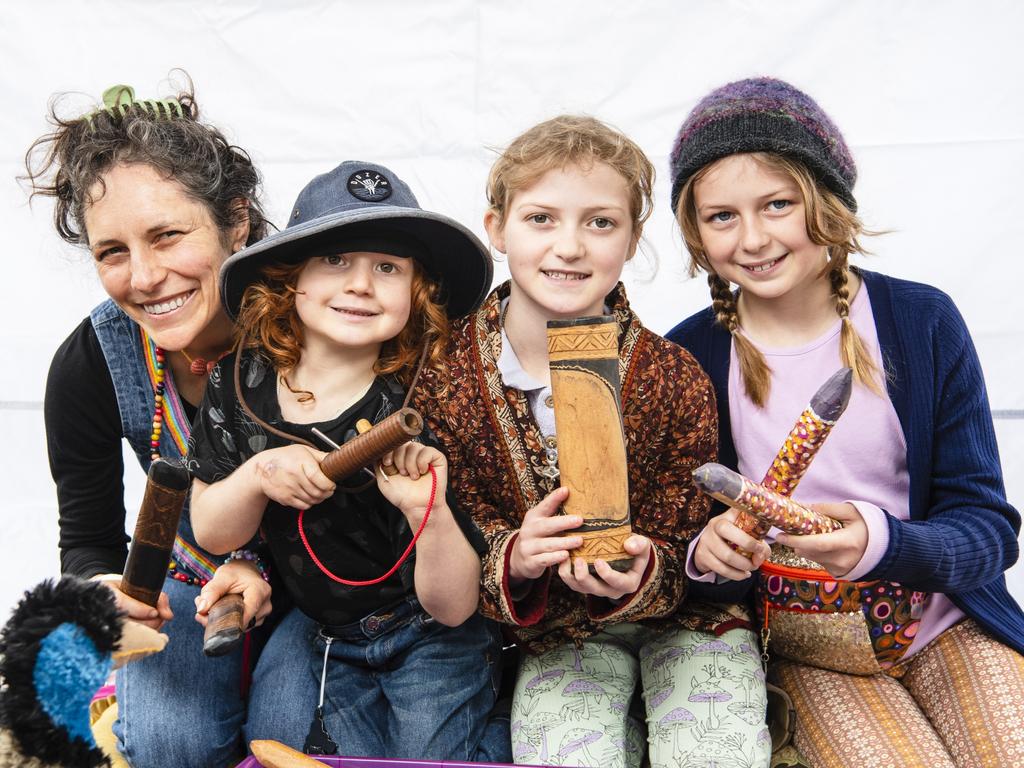 Lizzie Phillips with her kids (from left) Florian, Rosa-Mae and Ruby-Jean Phillips in the Children's Circle at World Environment Day Toowoomba celebrations at wet weather venue Rangeville State School, Sunday, June 4, 2023. Picture: Kevin Farmer